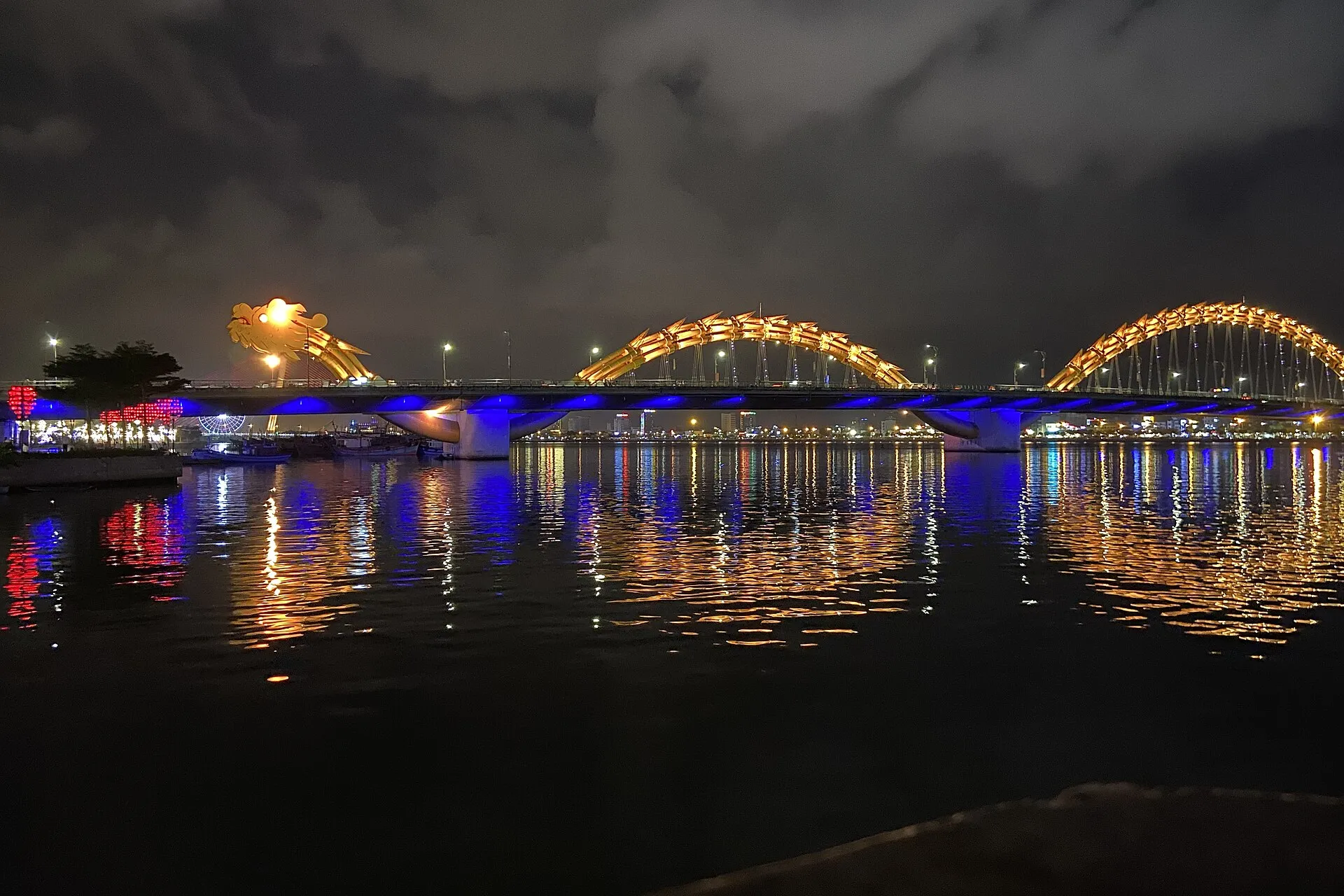 The Dragon Bridge lighting up the Han River in Da Nang at night